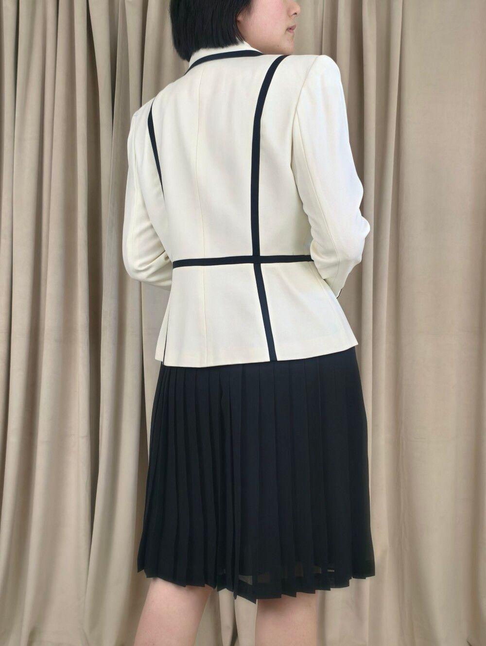 Vintage Gillian White Blazer with Black Trim and Black Pleated Skirt